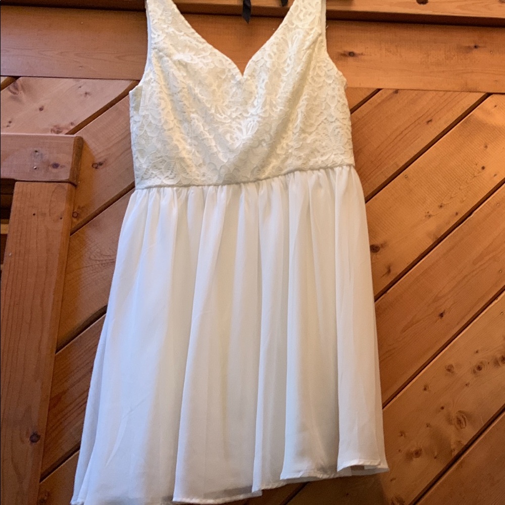 Women’s medium mini to mid length dress.